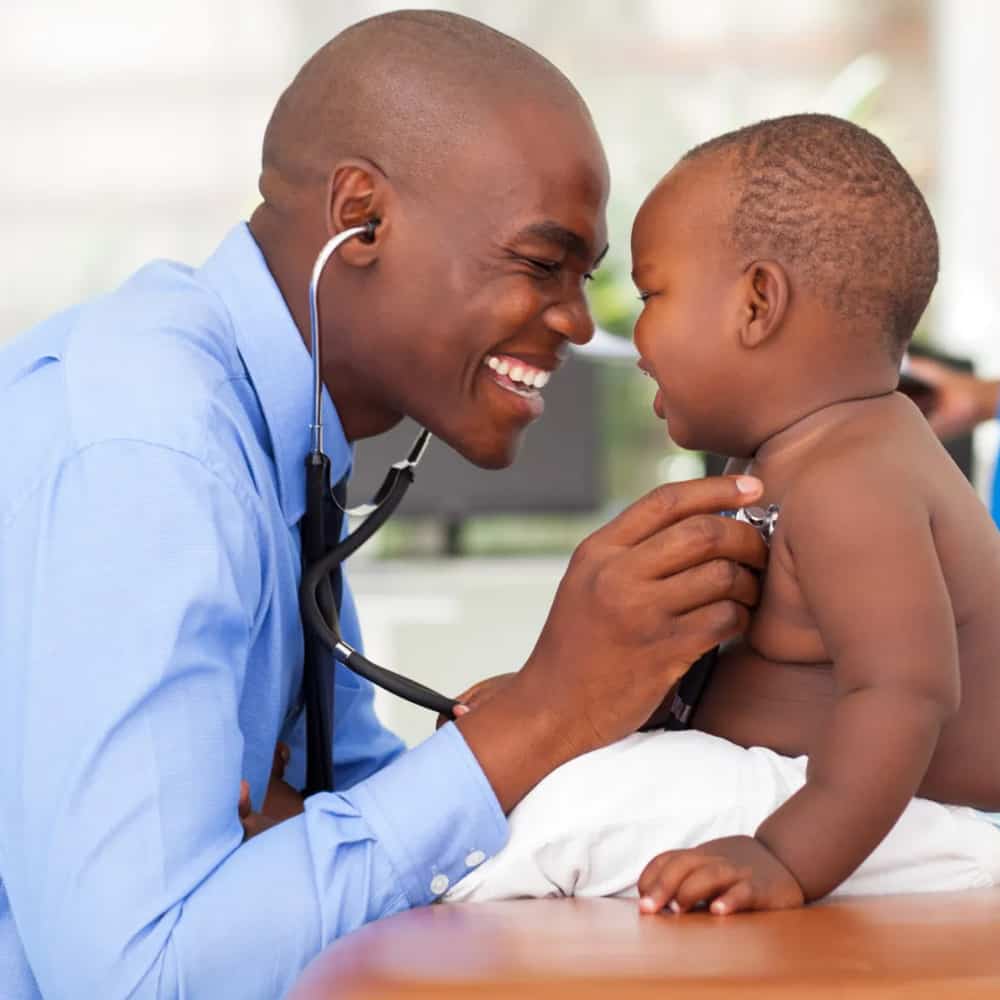 A doctor do a checkup on an infant.