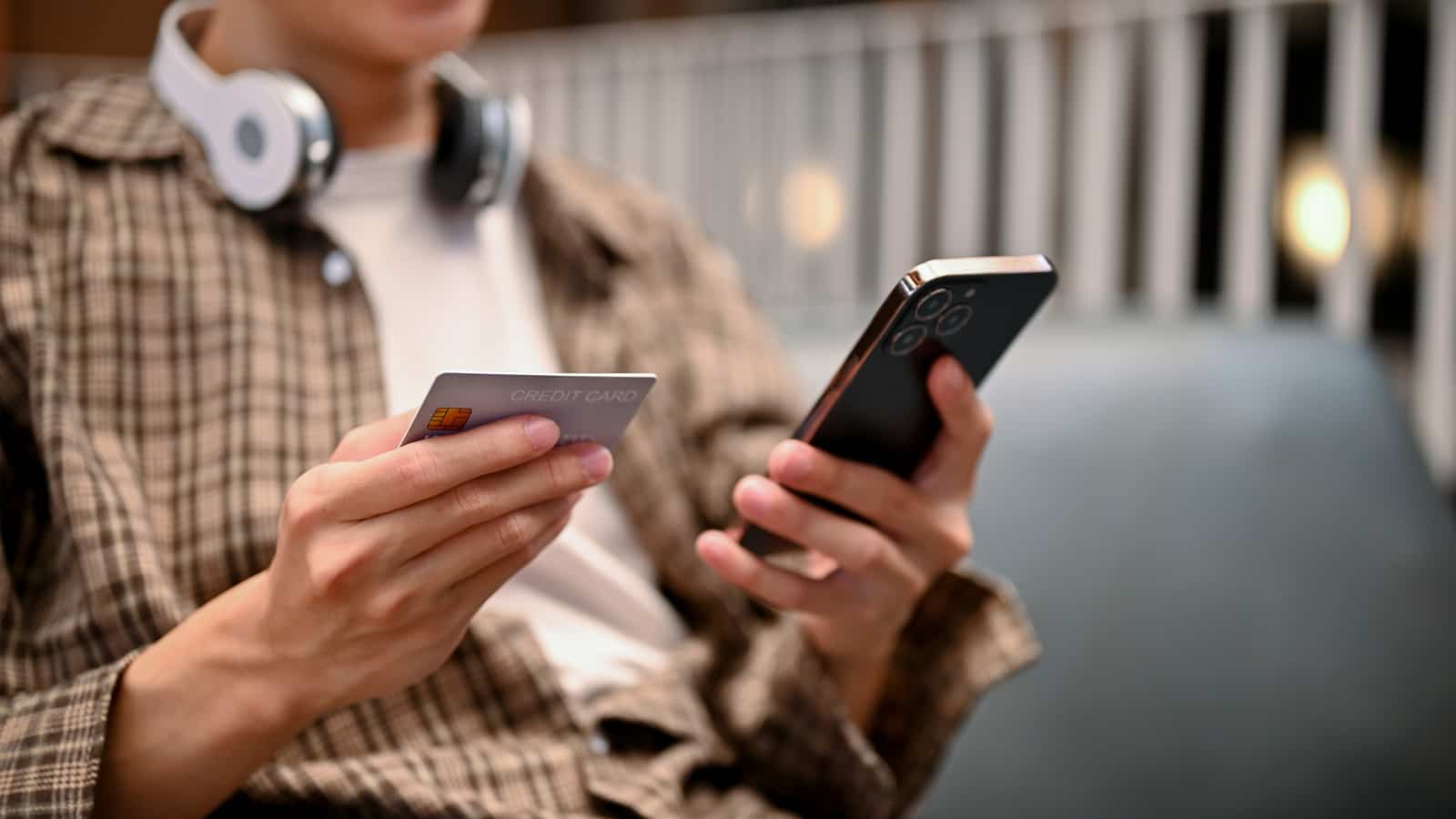 Asian man using a mobile phone