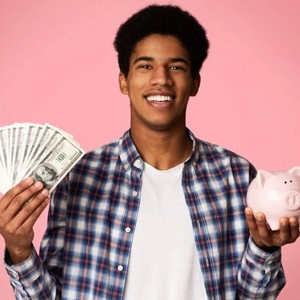 Young teen holding cash.