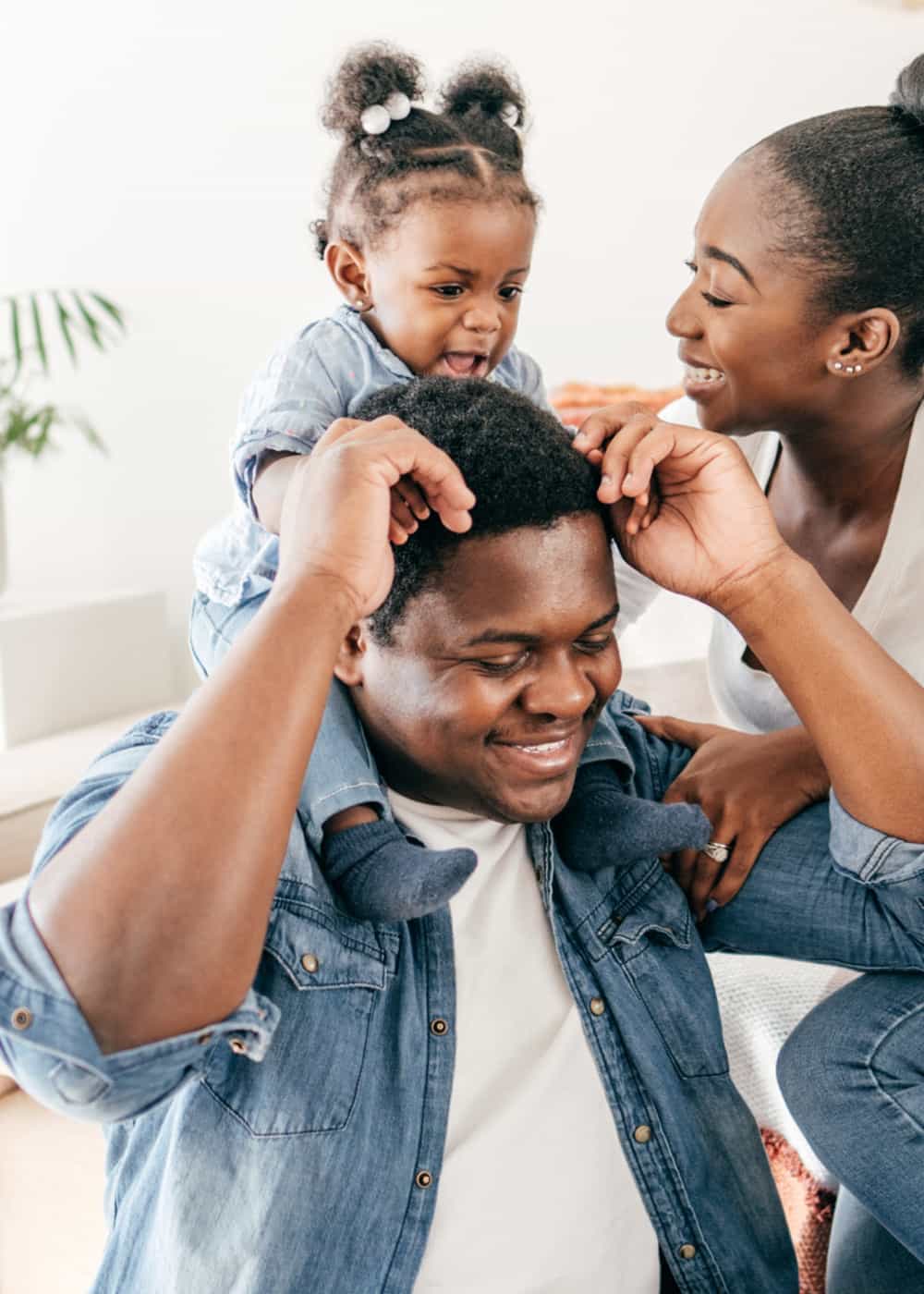 Mom and Dad with young daughter.